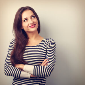 woman smiling and looking up