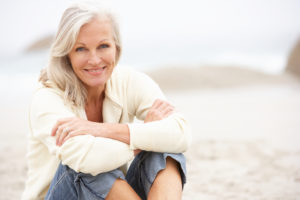 older-woman-on-a-beach